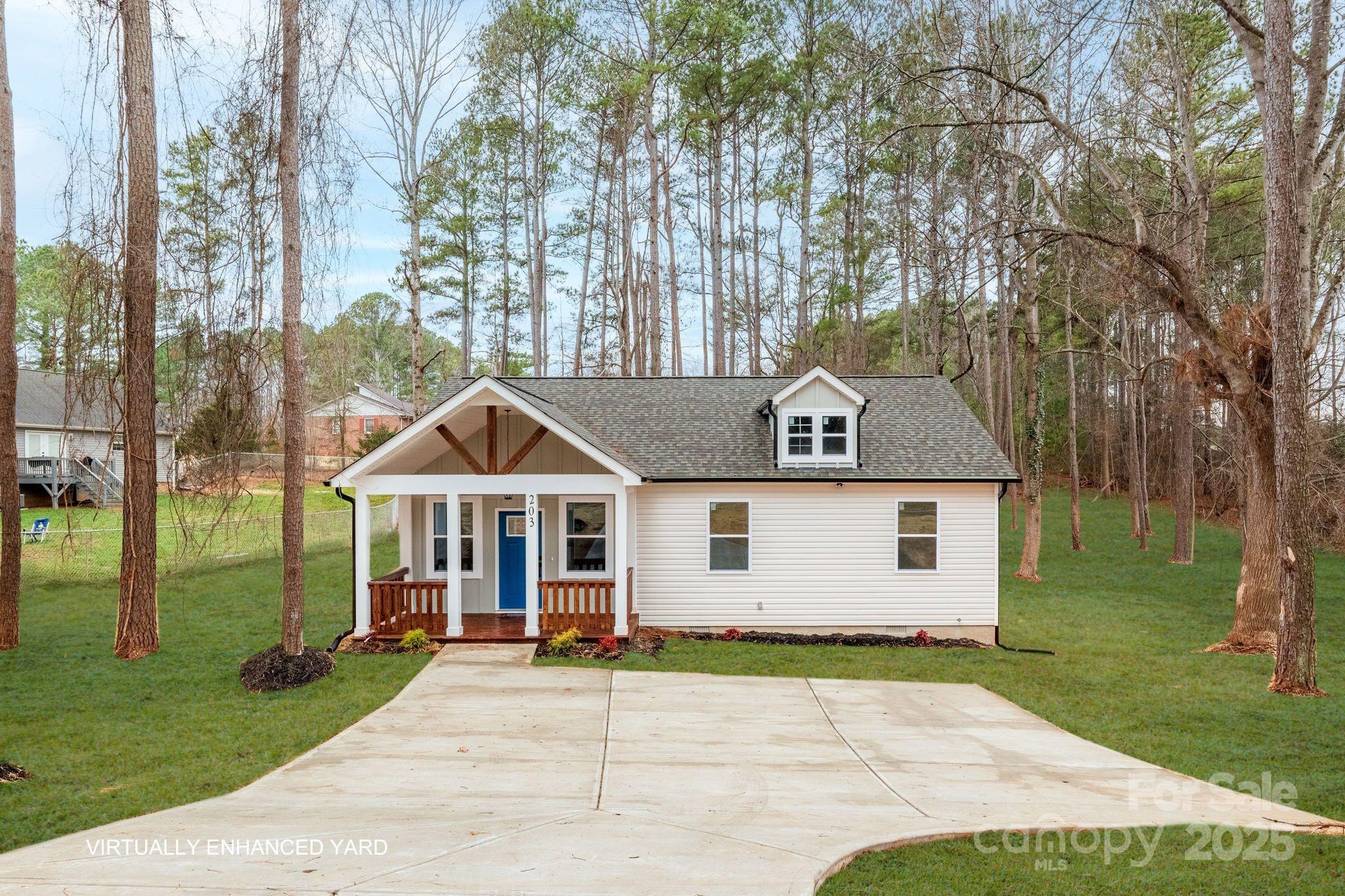 203 Bud Black Road Crouse, NC 28033 - Photo 1 of 47 a front view of a house with a yard