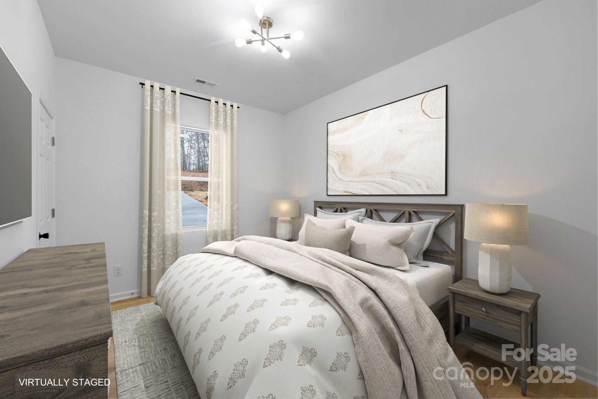 203 Bud Black Road Crouse, NC 28033 - Photo 19 of 47 a bedroom with a bed and a window