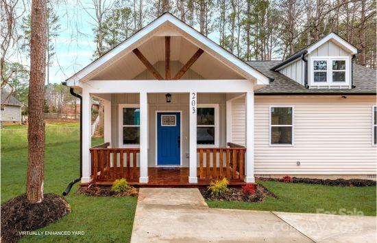 203 Bud Black Road Crouse, NC 28033 - Photo 3 of 47 a front view of a house with a yard