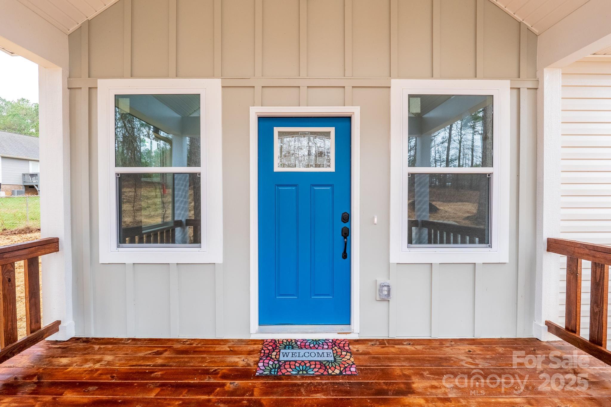 203 Bud Black Road Crouse, NC 28033 - Photo 36 of 47 a view of a bedroom with wooden floor and a window