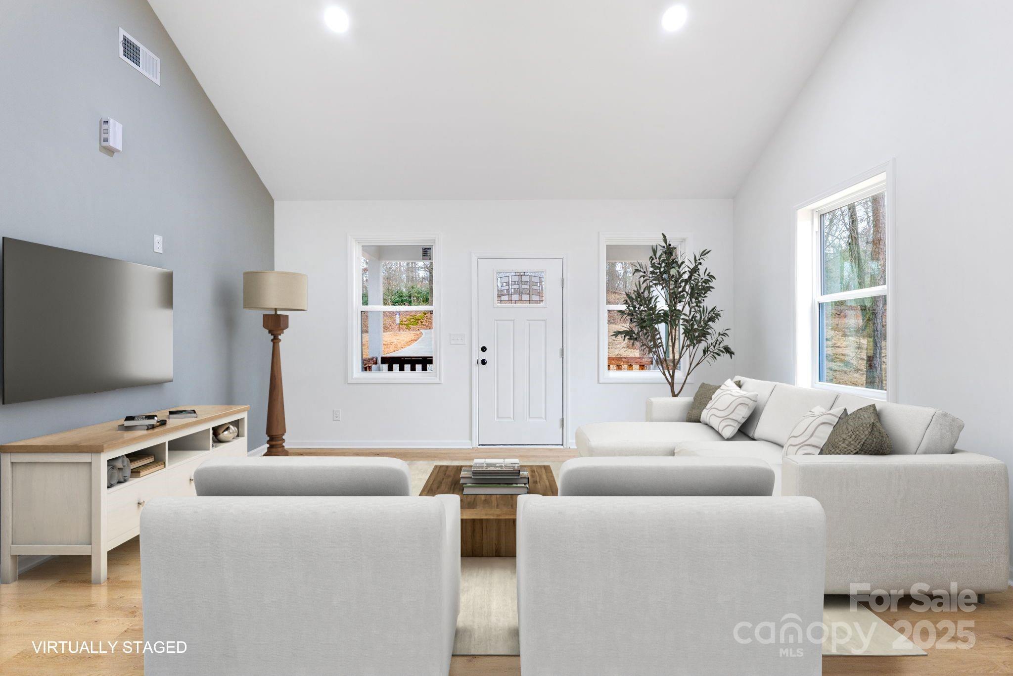 203 Bud Black Road Crouse, NC 28033 - Photo 5 of 47 a living room with furniture and a flat screen tv