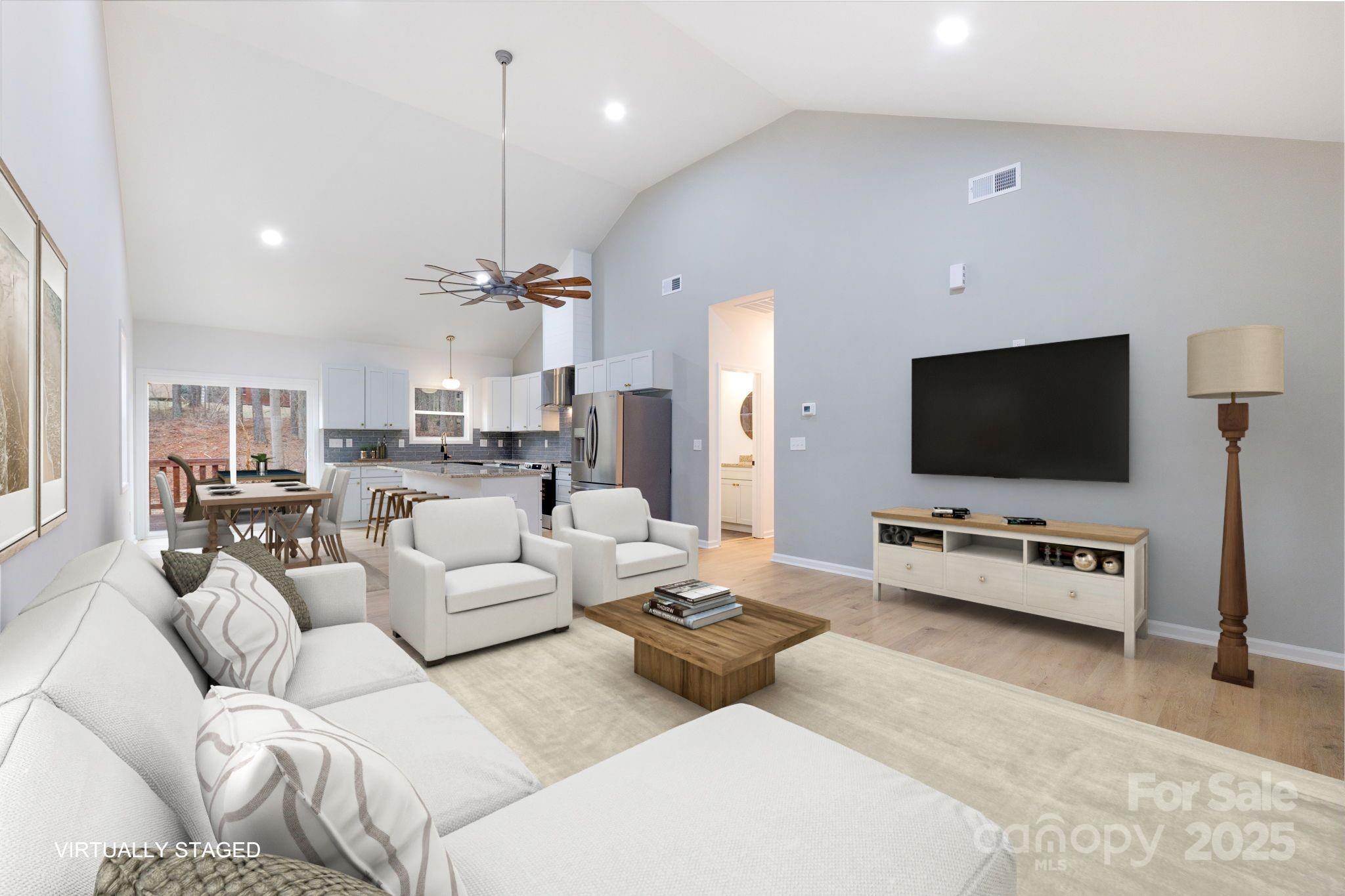 203 Bud Black Road Crouse, NC 28033 - Photo 7 of 47 a living room with furniture and a flat screen tv