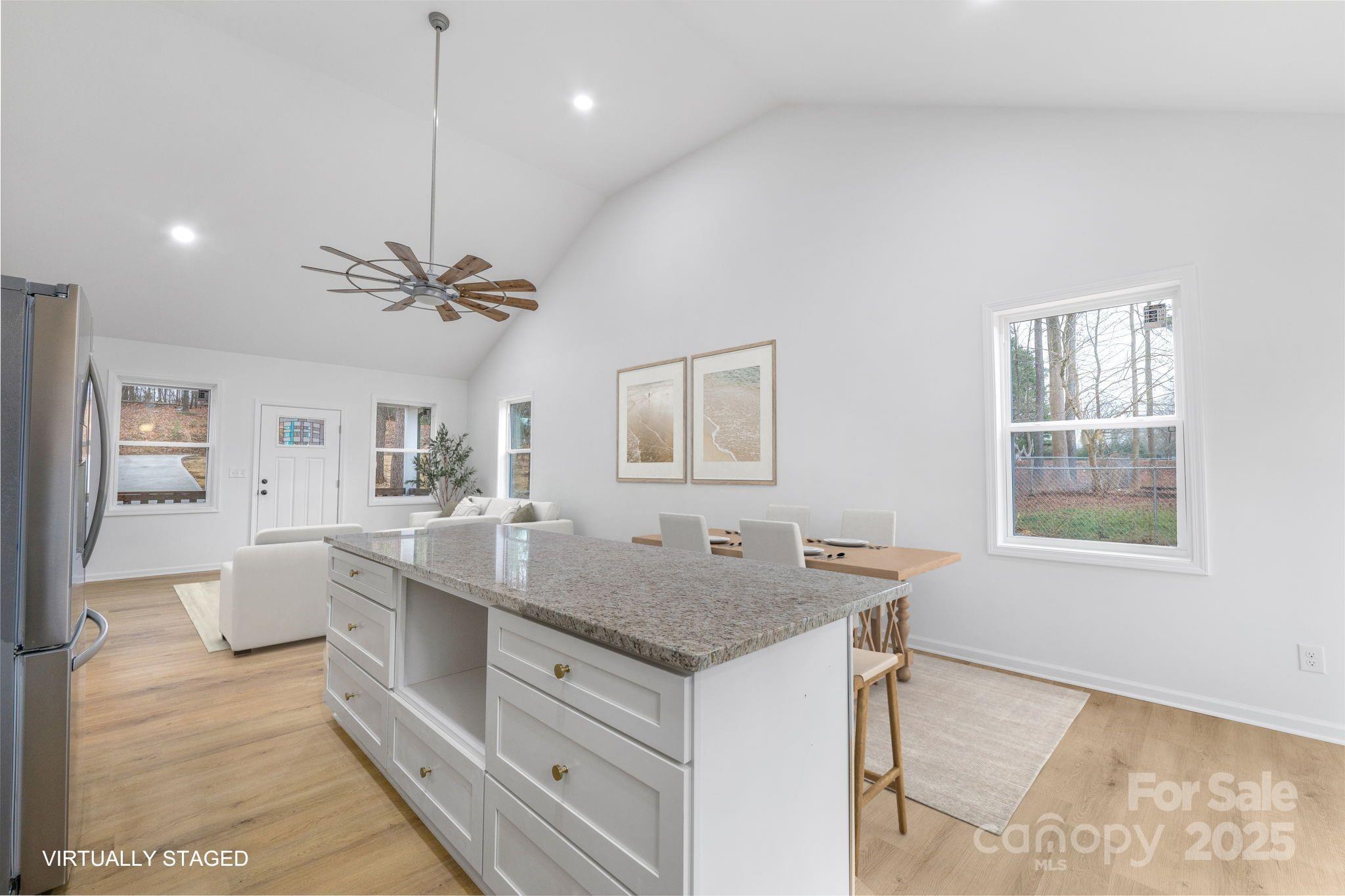 203 Bud Black Road Crouse, NC 28033 - Photo 10 of 47 a view of a center island and living room