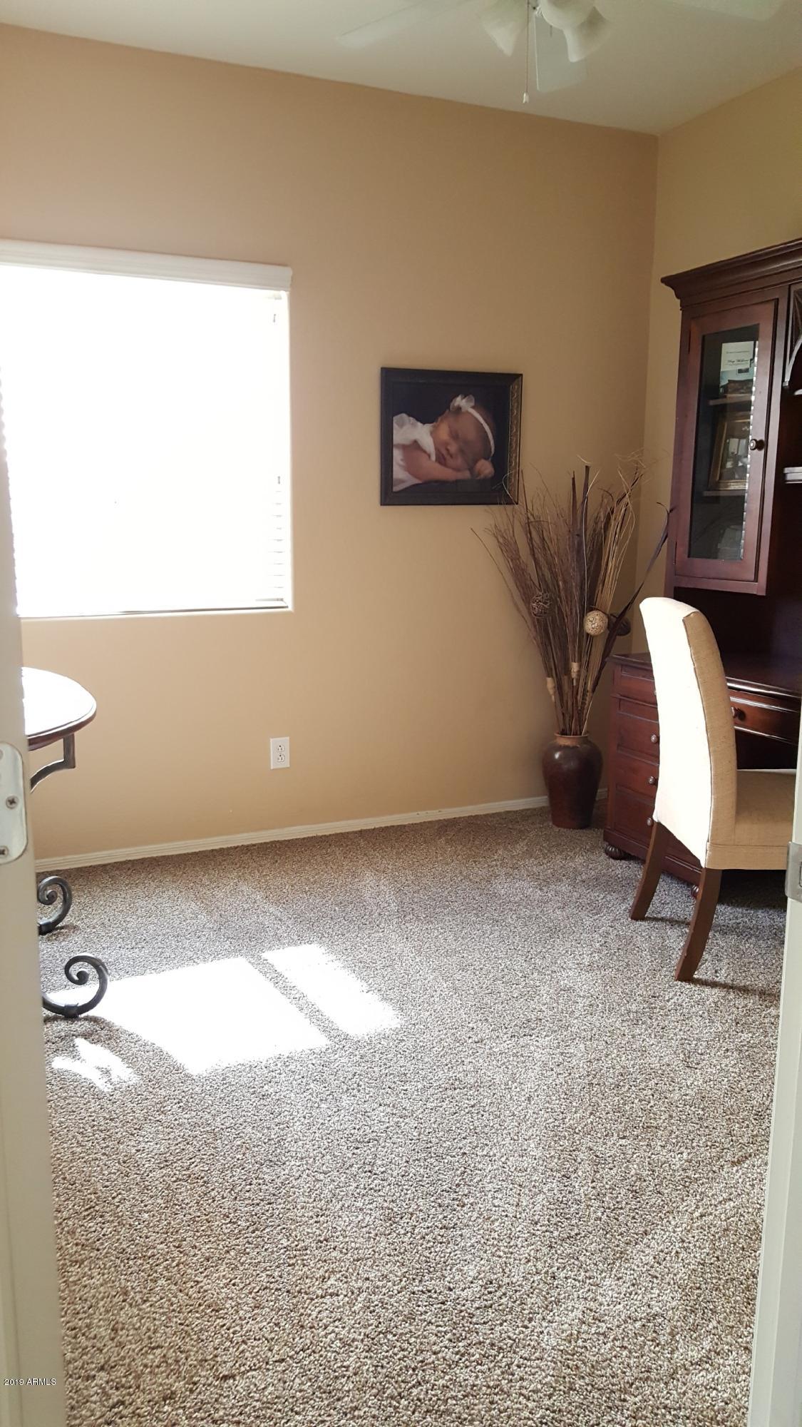 26132 West Burnett Road Buckeye, AZ 85396 - Photo 16 of 22 a view of workspace room with window