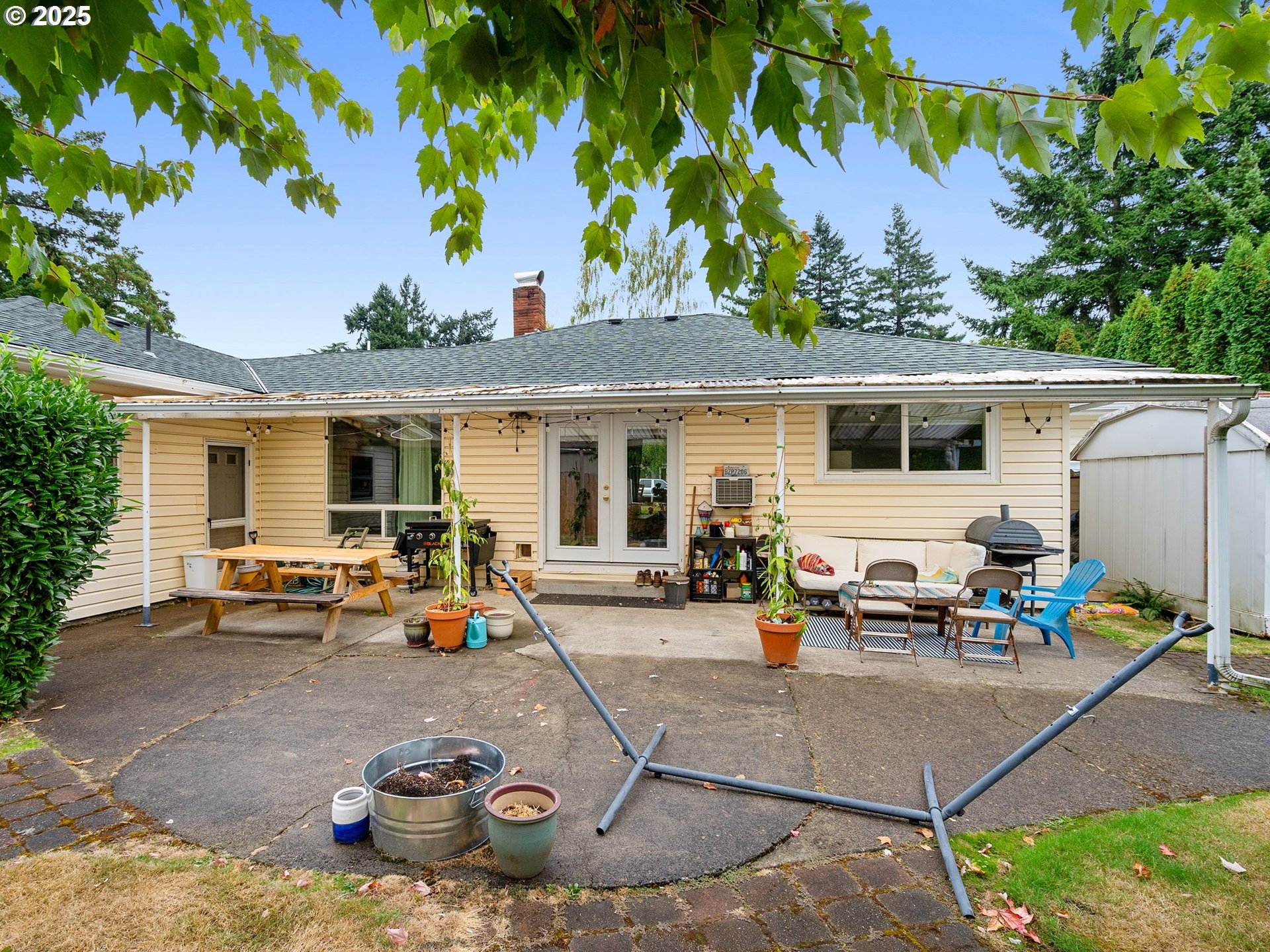 1245 Northeast 118th Avenue Portland, OR 97220 - Photo 17 of 35 a view of a house with a patio