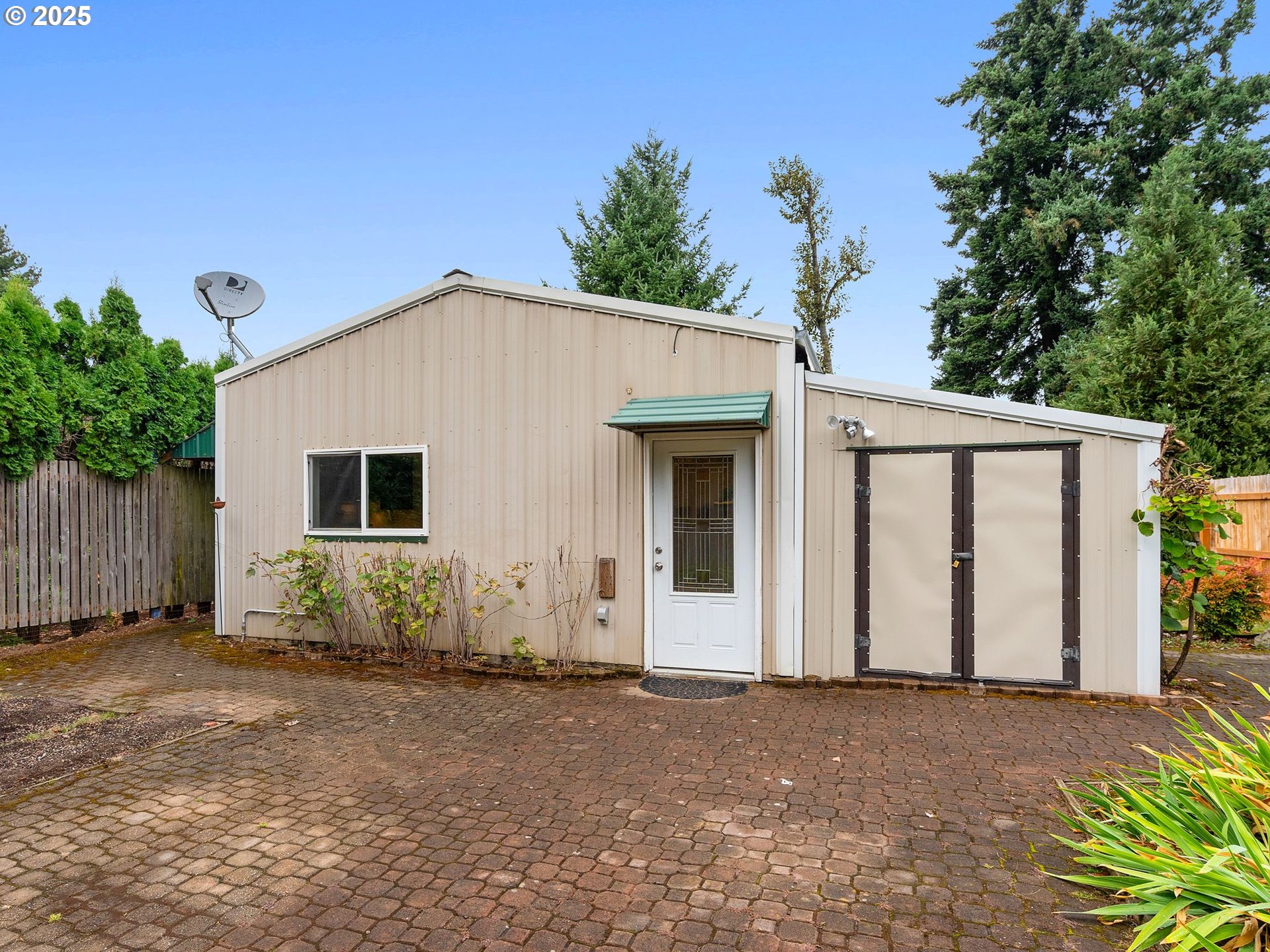 1245 Northeast 118th Avenue Portland, OR 97220 - Photo 20 of 35 a view of a house with backyard and trees