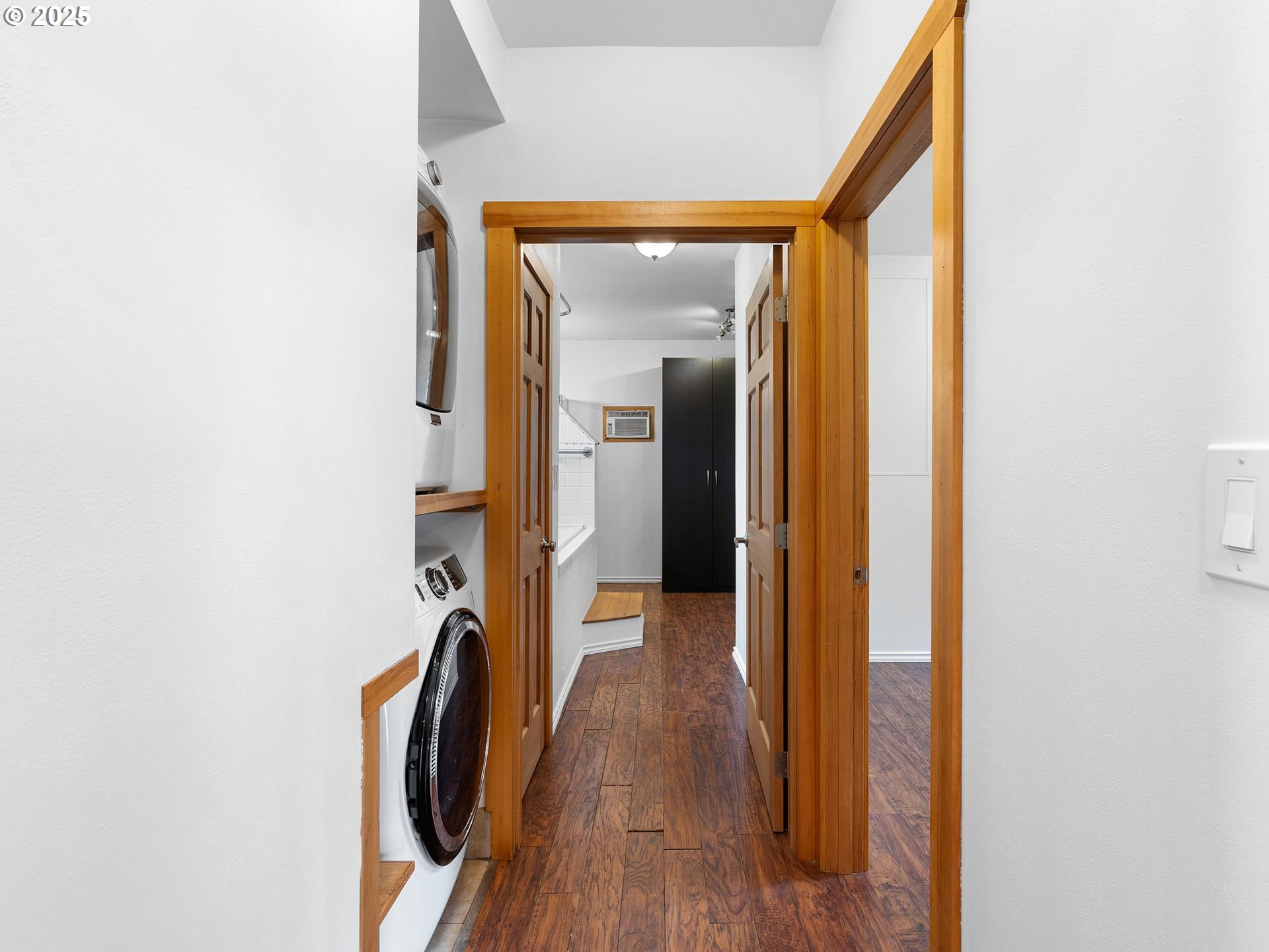 1245 Northeast 118th Avenue Portland, OR 97220 - Photo 26 of 35 a view of a hallway with wooden floor and staircase