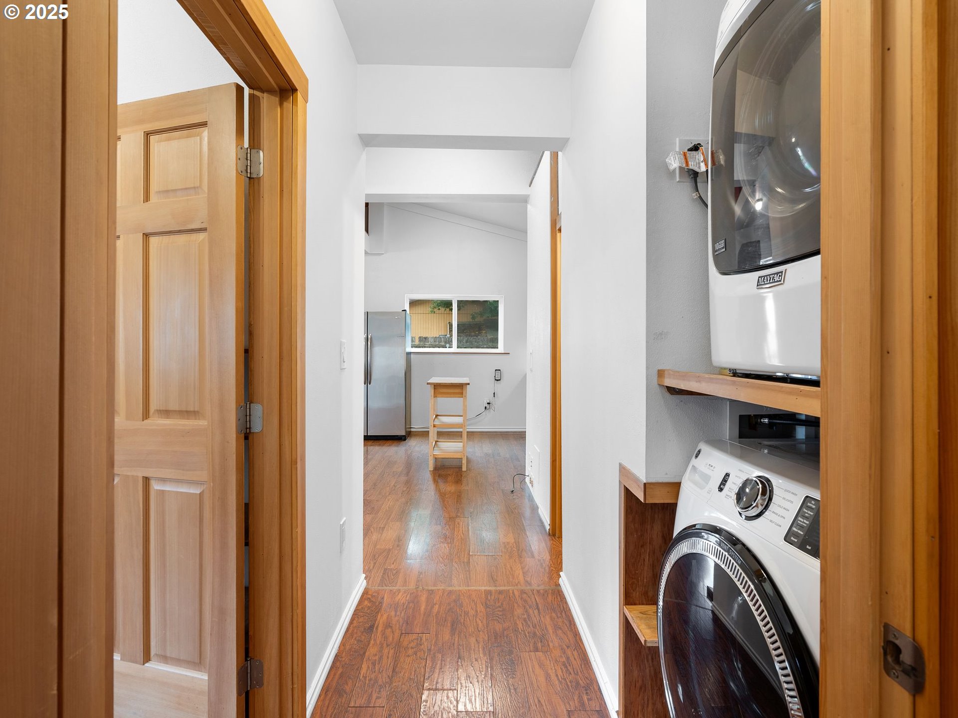 1245 Northeast 118th Avenue Portland, OR 97220 - Photo 27 of 35 a view of a bedroom with washer and dryer