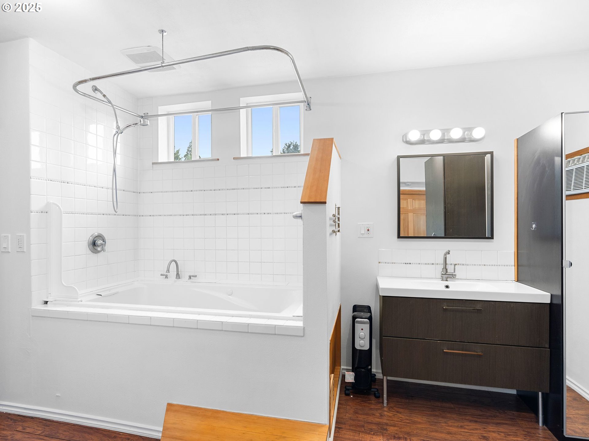 1245 Northeast 118th Avenue Portland, OR 97220 - Photo 32 of 35 a bathroom with a tub sink and mirror