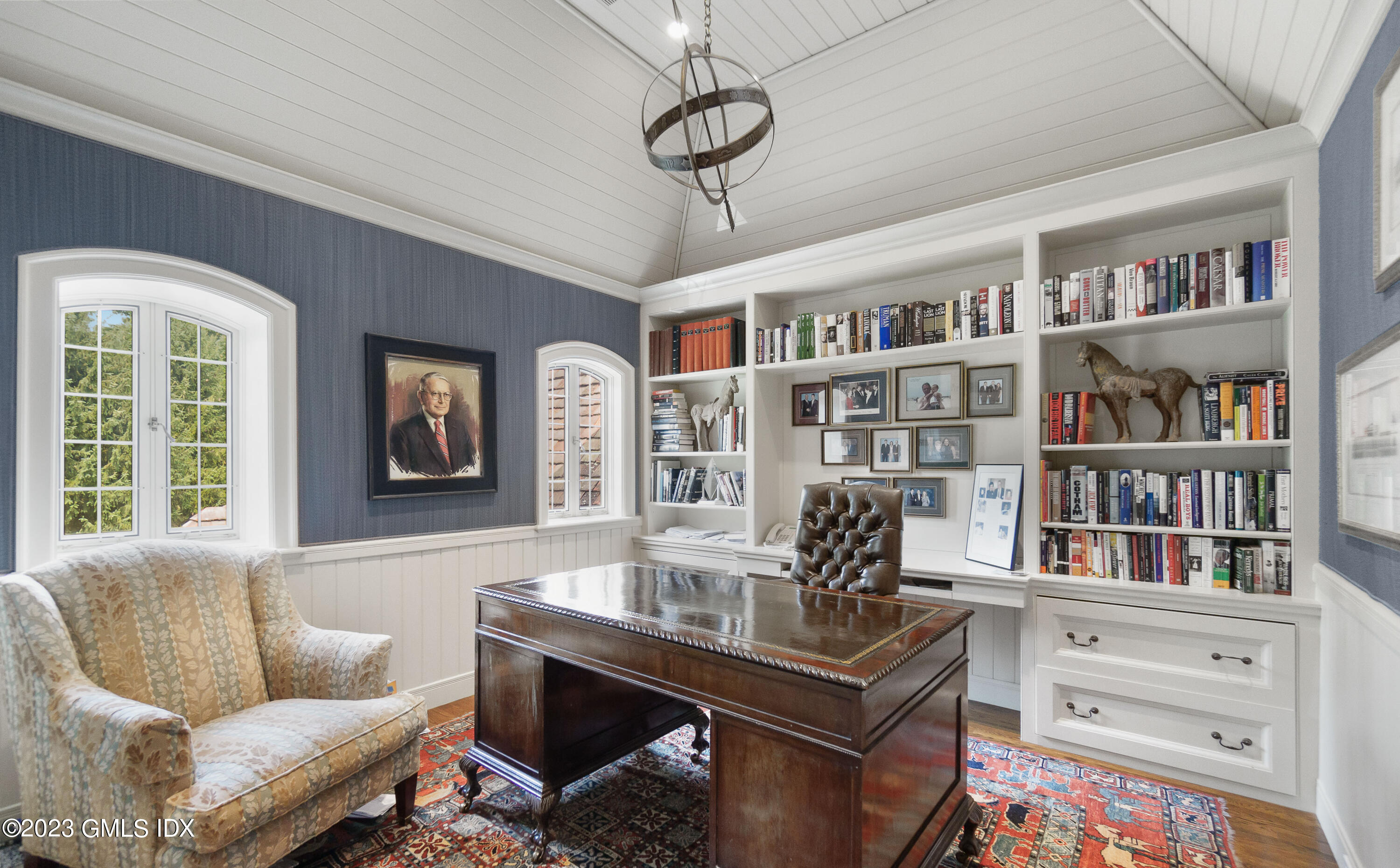 33 Midwood Road Greenwich, CT 06830 - Photo 18 of 22 a living room with furniture cabinets and window