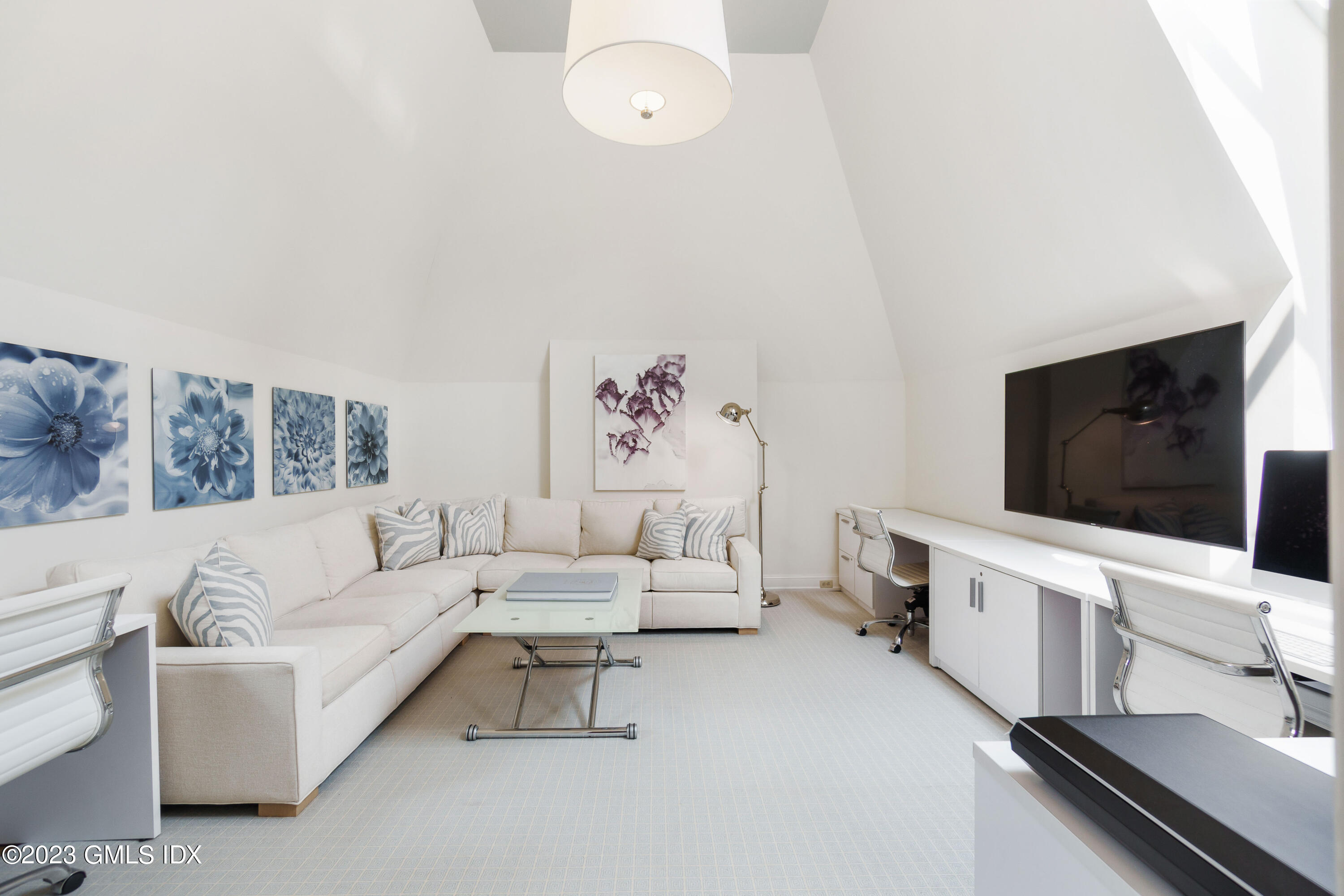 33 Midwood Road Greenwich, CT 06830 - Photo 19 of 22 a living room with furniture and a flat screen tv