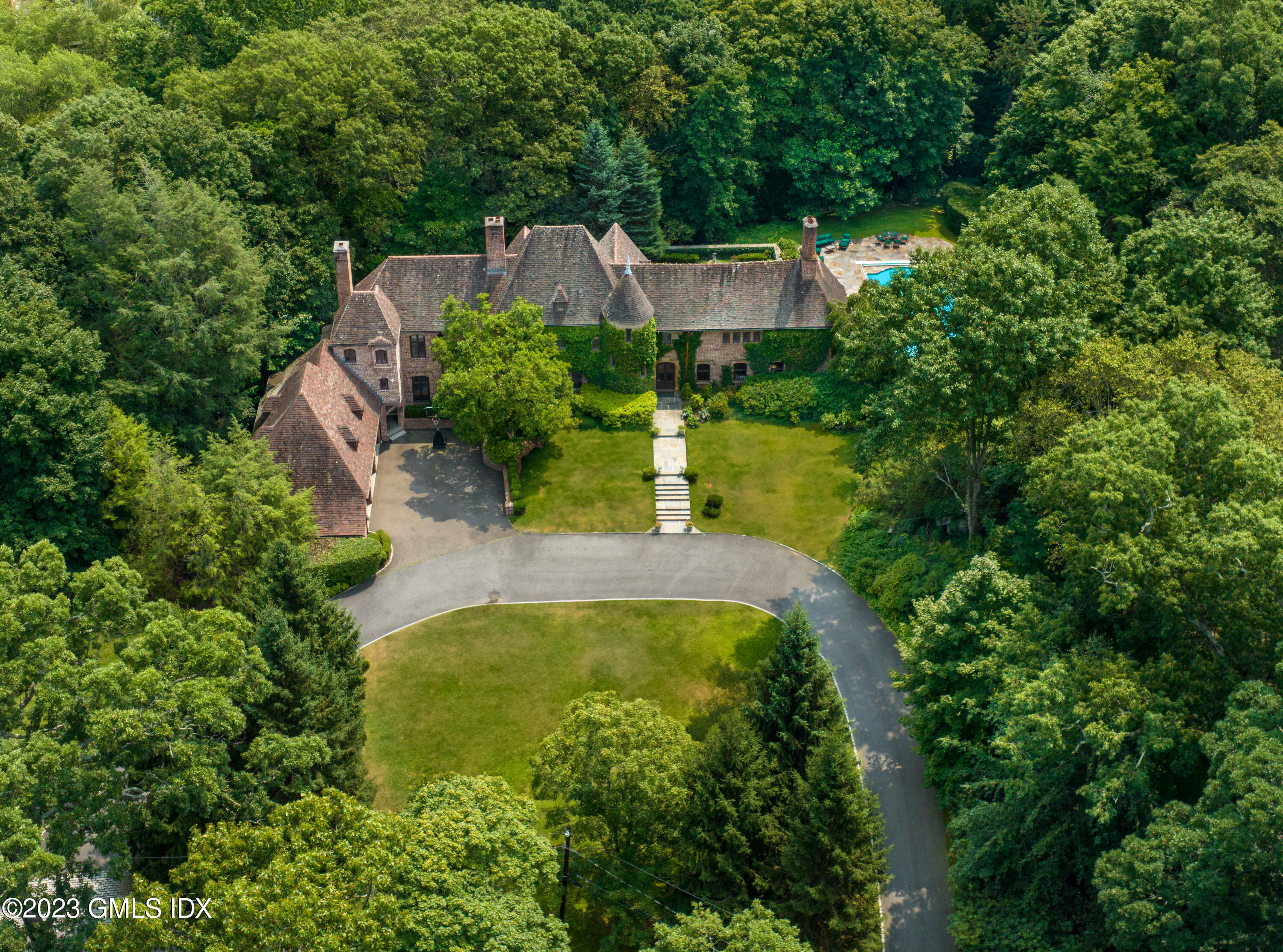 33 Midwood Road Greenwich, CT 06830 - Photo 21 of 22 an aerial view of a house with a yard basket ball court and outdoor seating