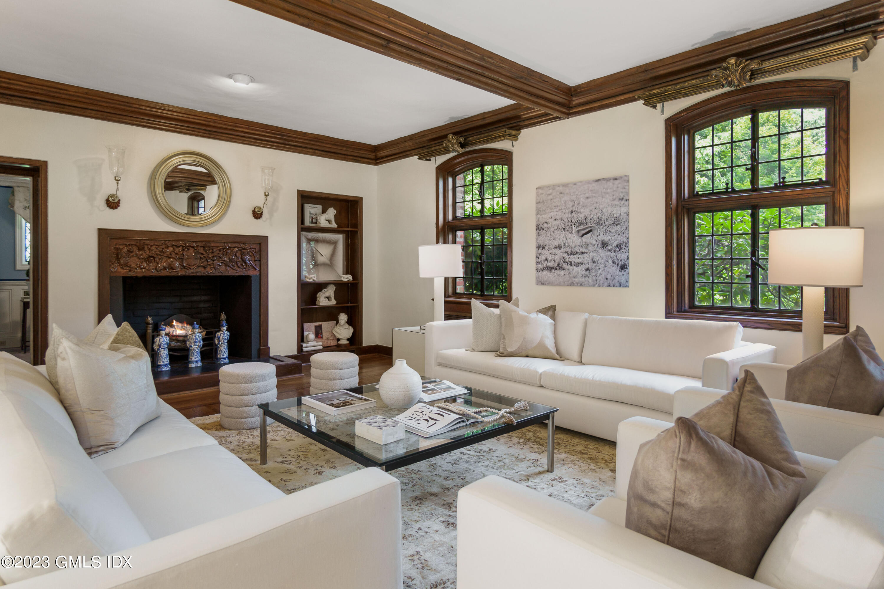 33 Midwood Road Greenwich, CT 06830 - Photo 4 of 22 a living room with furniture and a fireplace