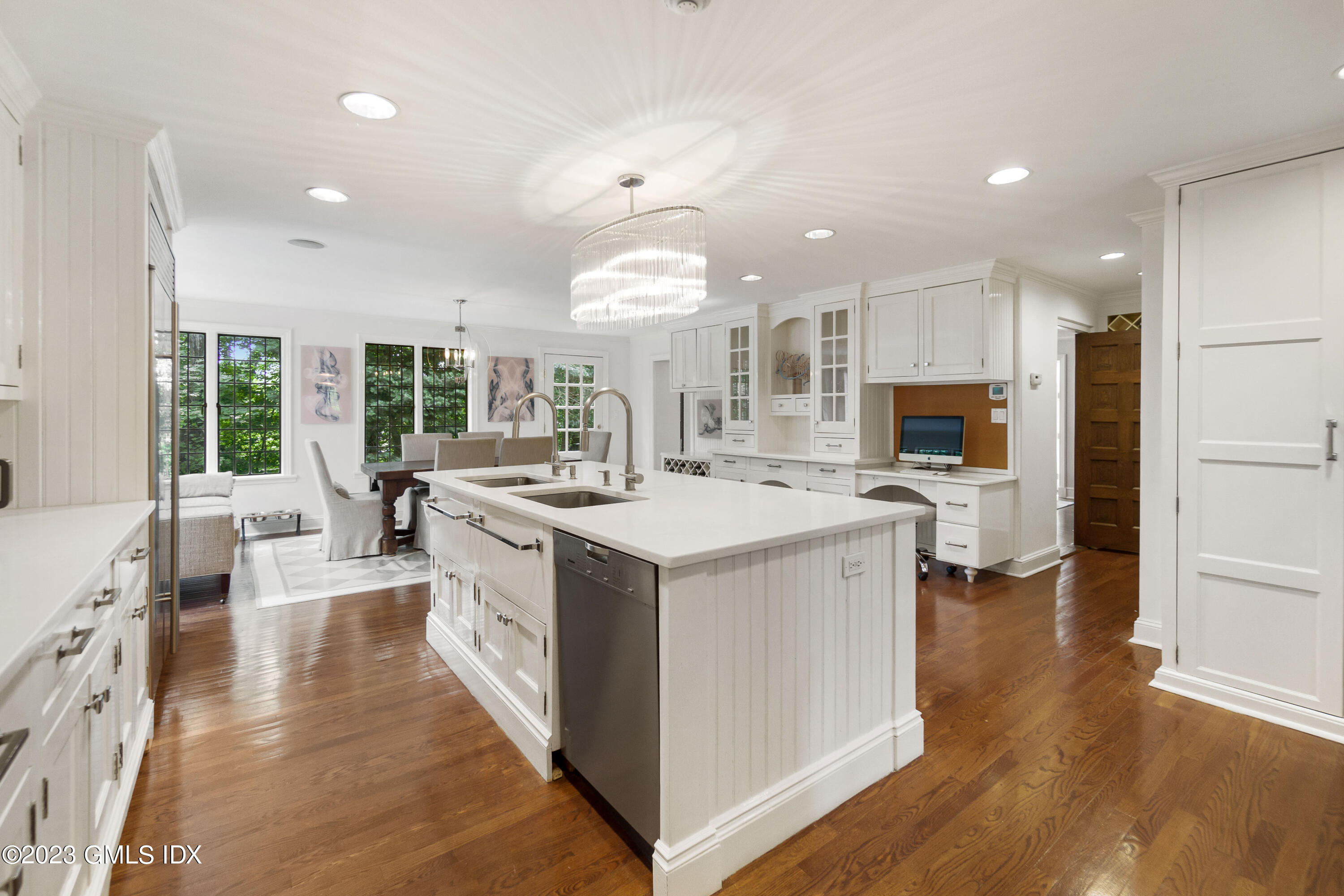33 Midwood Road Greenwich, CT 06830 - Photo 8 of 22 a kitchen with a stove a sink and a refrigerator