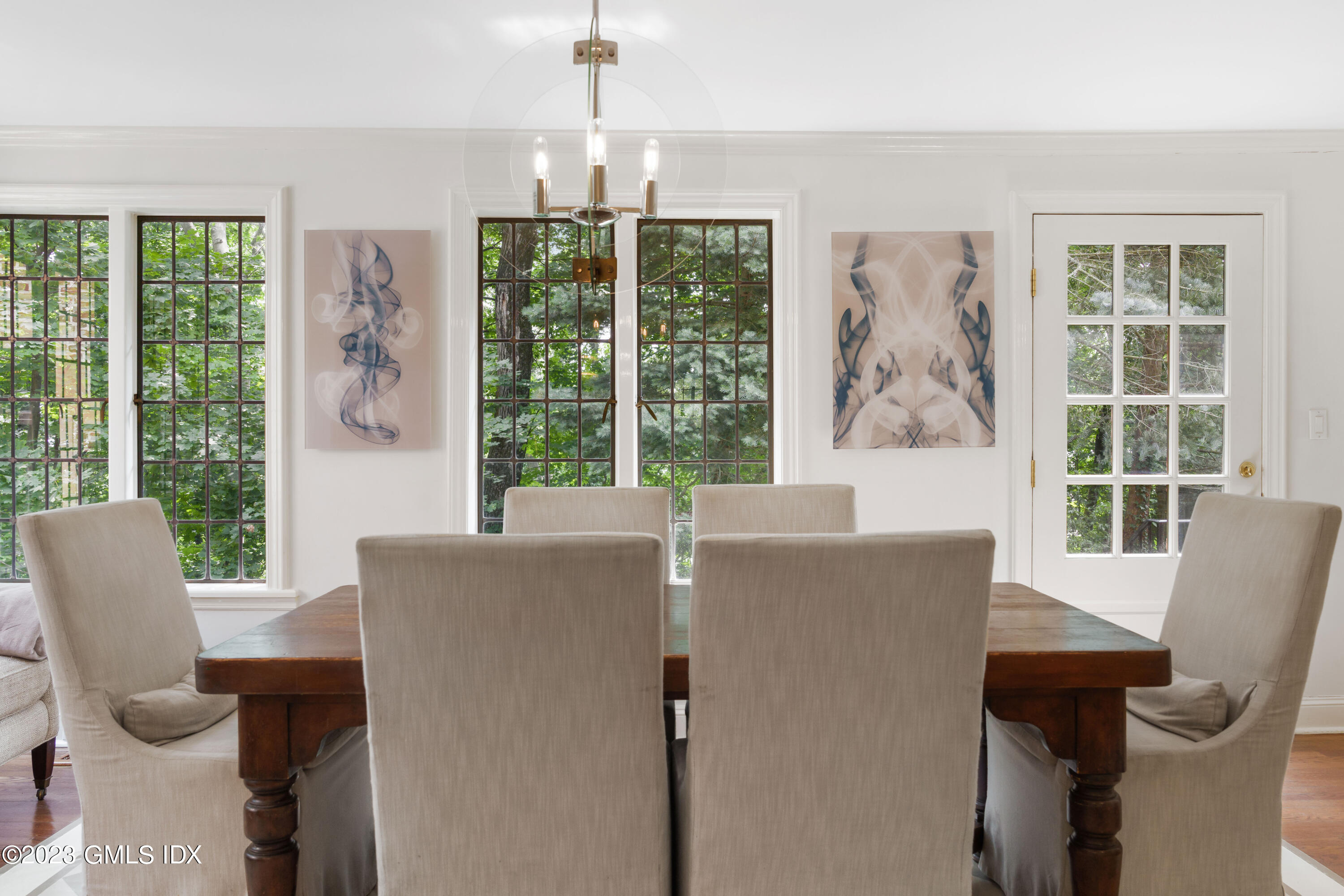 33 Midwood Road Greenwich, CT 06830 - Photo 10 of 22 a living room with furniture and large windows