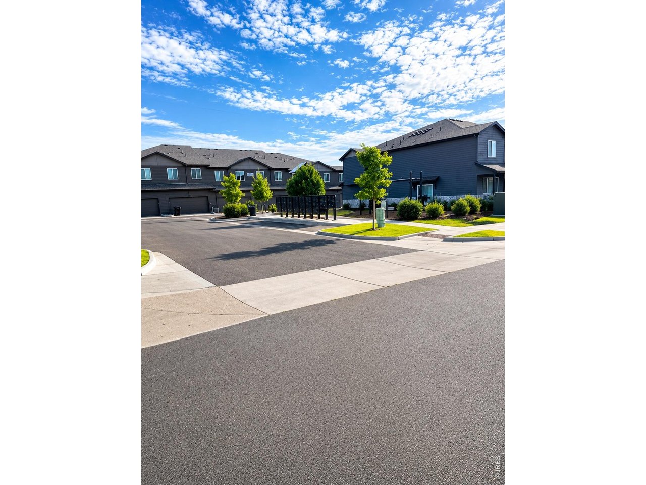 6939 4th St Road, Unit 1 Greeley, CO 80634 - Photo 21 of 30 a view of swimming pool with outdoor seating