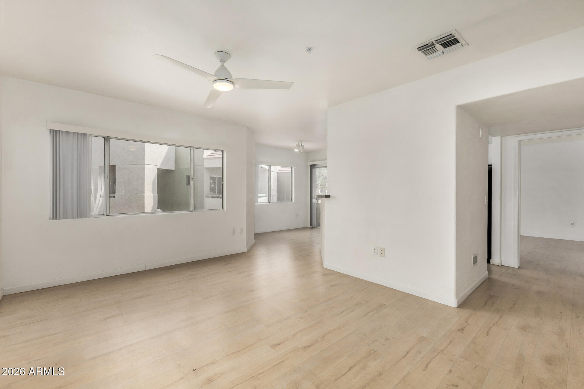 1295 North Ash Street, Unit 828 Gilbert, AZ 85233 - Photo 9 of 43 a view of an empty room with a window
