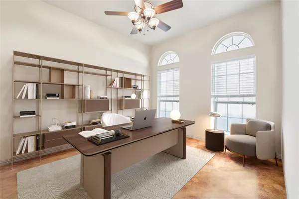 a bedroom with a large bed and a flat screen tv