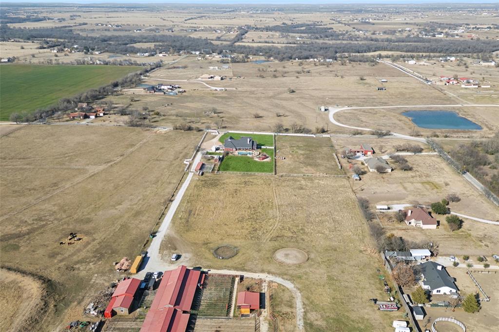 Tbd Mitchell Road Krum, TX 76249 - Photo 36 of 39 an aerial view of residential houses with outdoor space