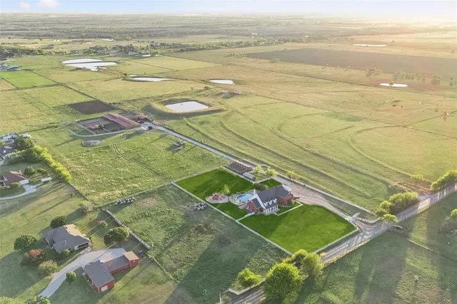 a view of an ocean and a houses