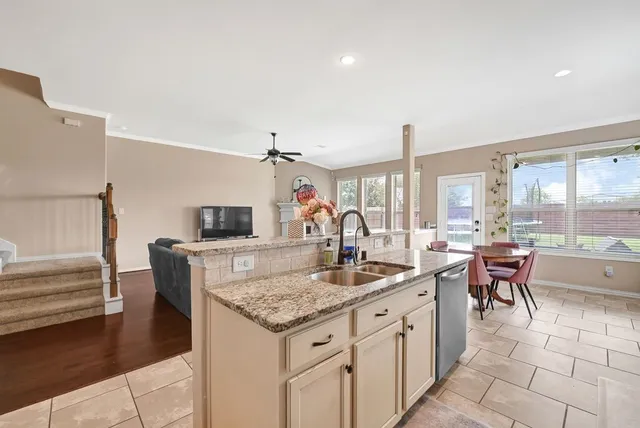 a very nice looking dining room with a table and chairs