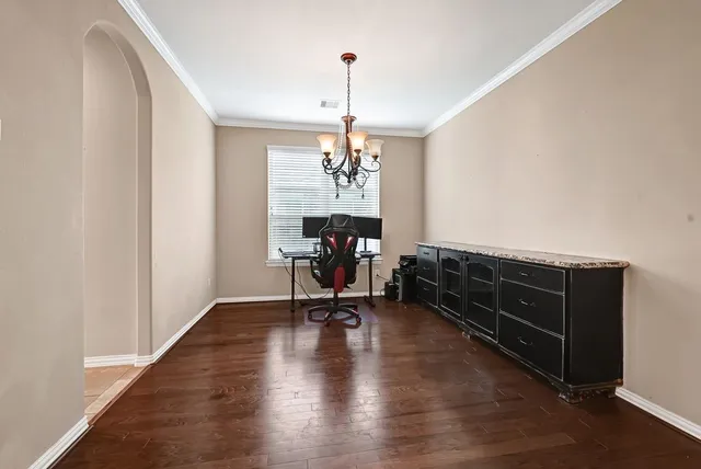 a view of a room with furniture window and wooden floor