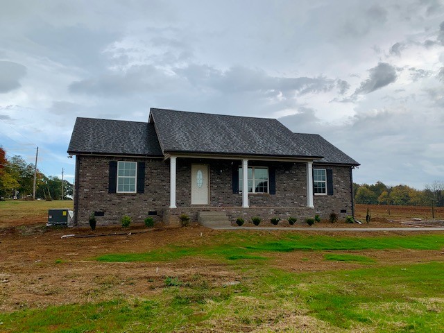 492 Shaub Road Portland, TN 37148 - Photo 2 of 2 a front view of house with yard and green space