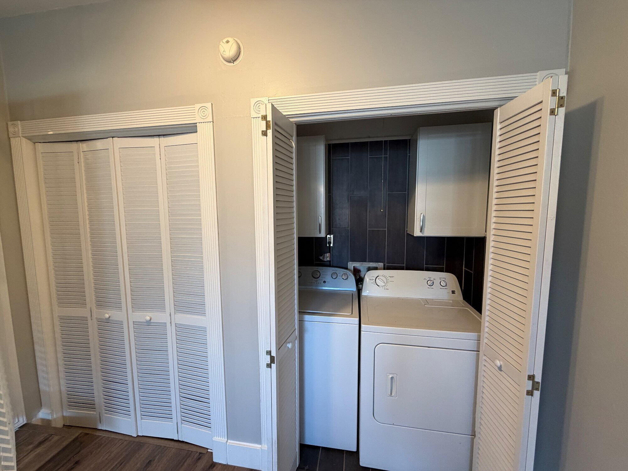 2703 30th Street Lubbock, TX 79410 - Photo 8 of 16 a utility room with dryer and washer