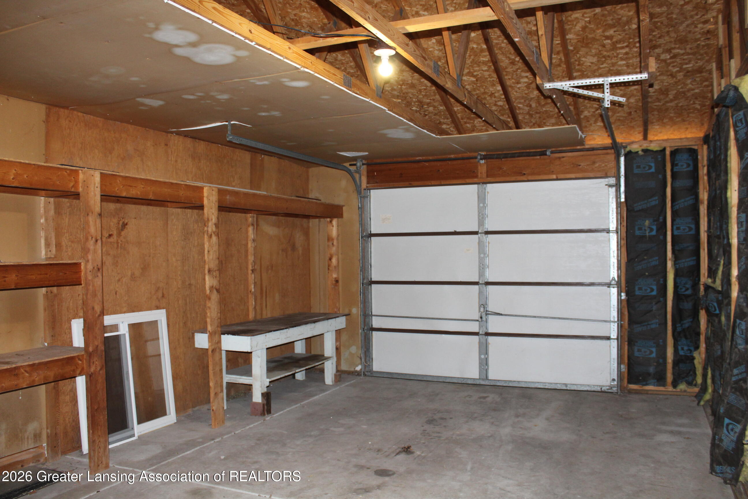 8635 West Herbison Road Eagle, MI 48822 - Photo 41 of 49 Interior Garage