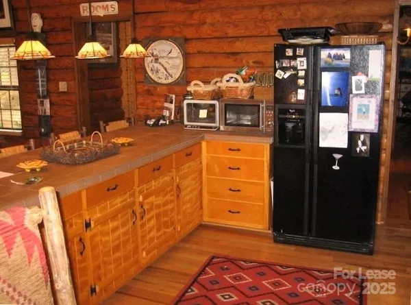 a view of a dresser with kitchen