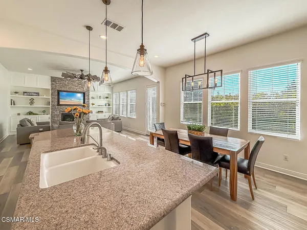 a spacious bedroom with a bed and a window