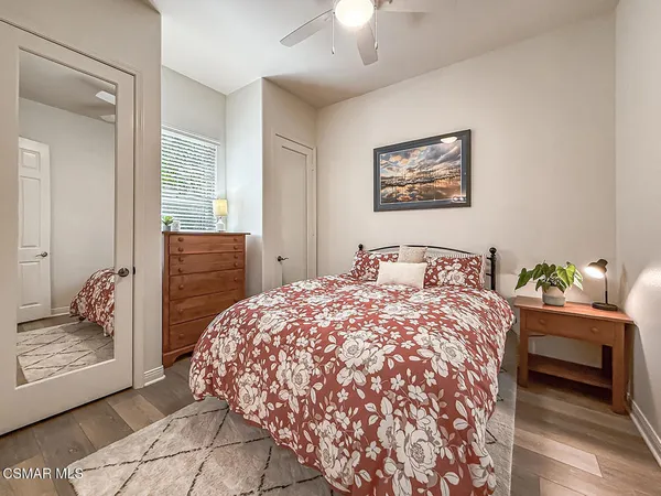 a bathroom with a toilet and a bathtub