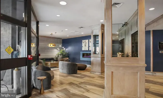 a view of a kitchen with kitchen island dining table and chairs