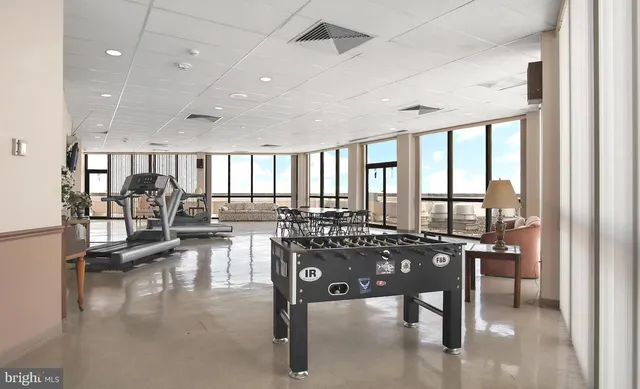 a view of entryway with wooden walls