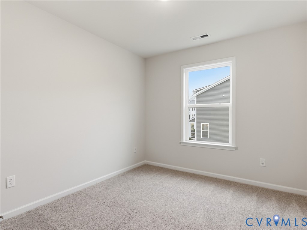 157 Corcoran Way Aylett, VA 23009 - Photo 16 of 22 a view of an empty room with a window