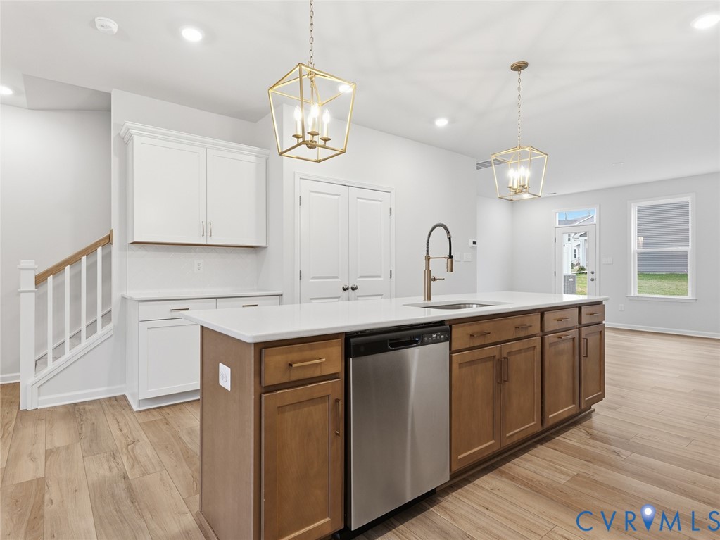 157 Corcoran Way Aylett, VA 23009 - Photo 4 of 22 a kitchen with a sink cabinets and wooden floor