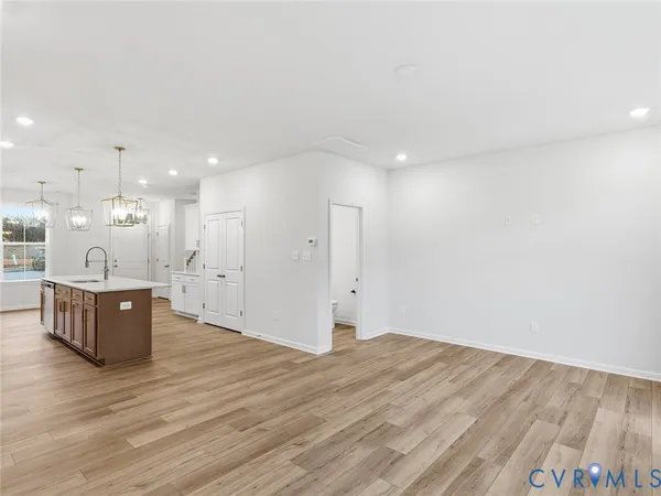 a view of kitchen with wooden floor