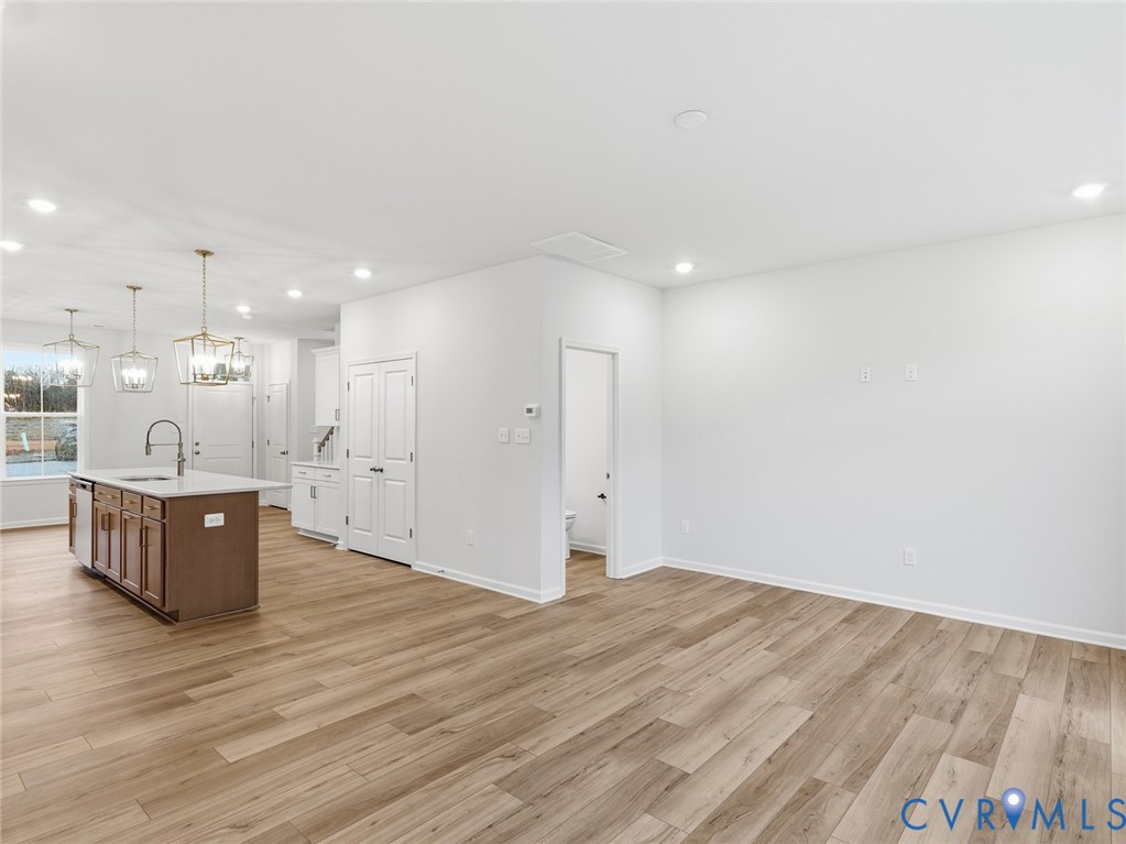 157 Corcoran Way Aylett, VA 23009 - Photo 8 of 22 a view of kitchen with wooden floor