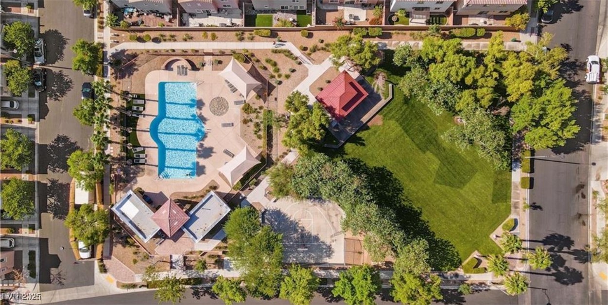 7708 Custom Weave Court Las Vegas, NV 89149 - Photo 32 of 32 Aerial perspective of suburban area featuring a pool