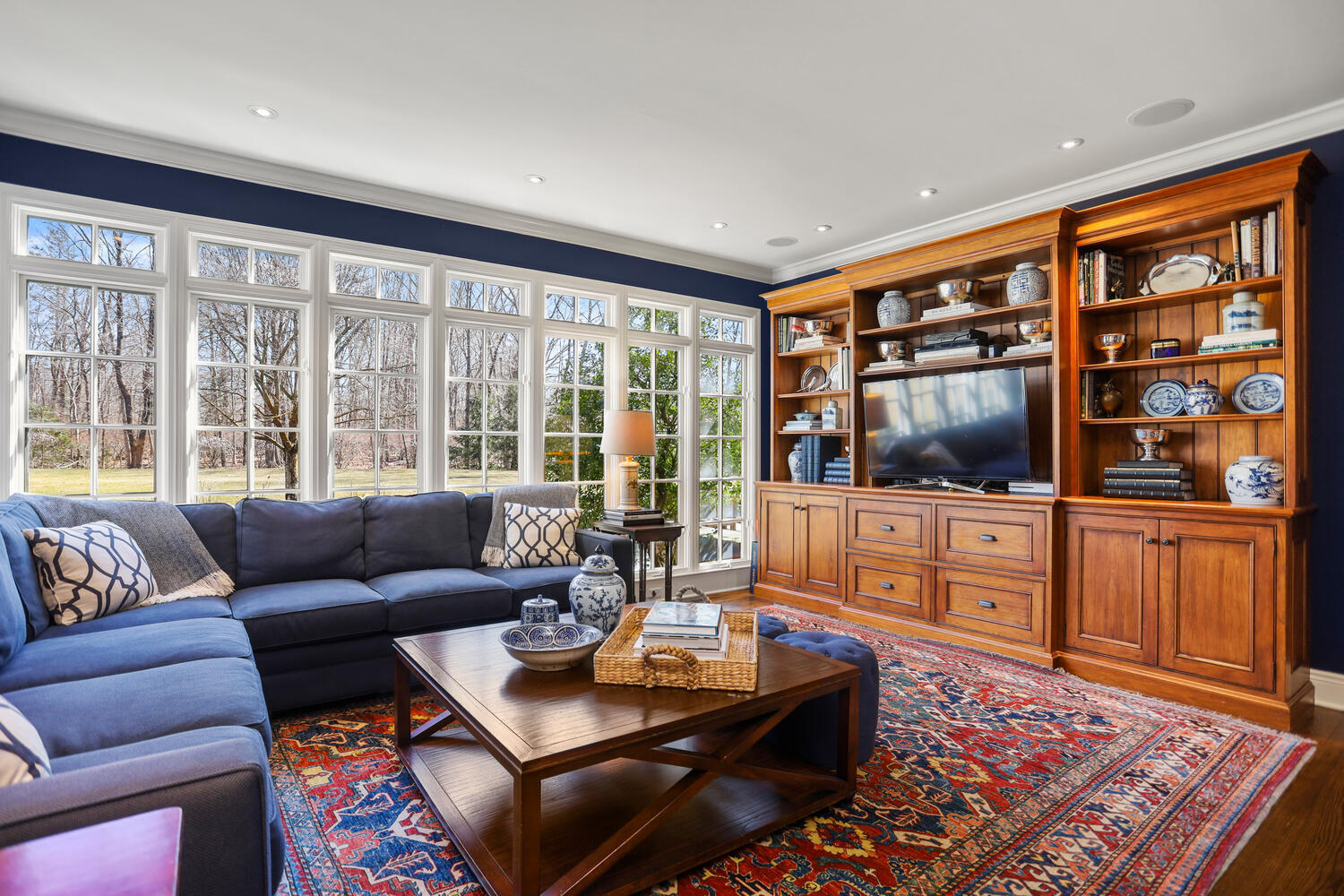 26 Beech Road New Canaan, CT 06840 - Photo 13 of 41 a living room with furniture and a flat screen tv