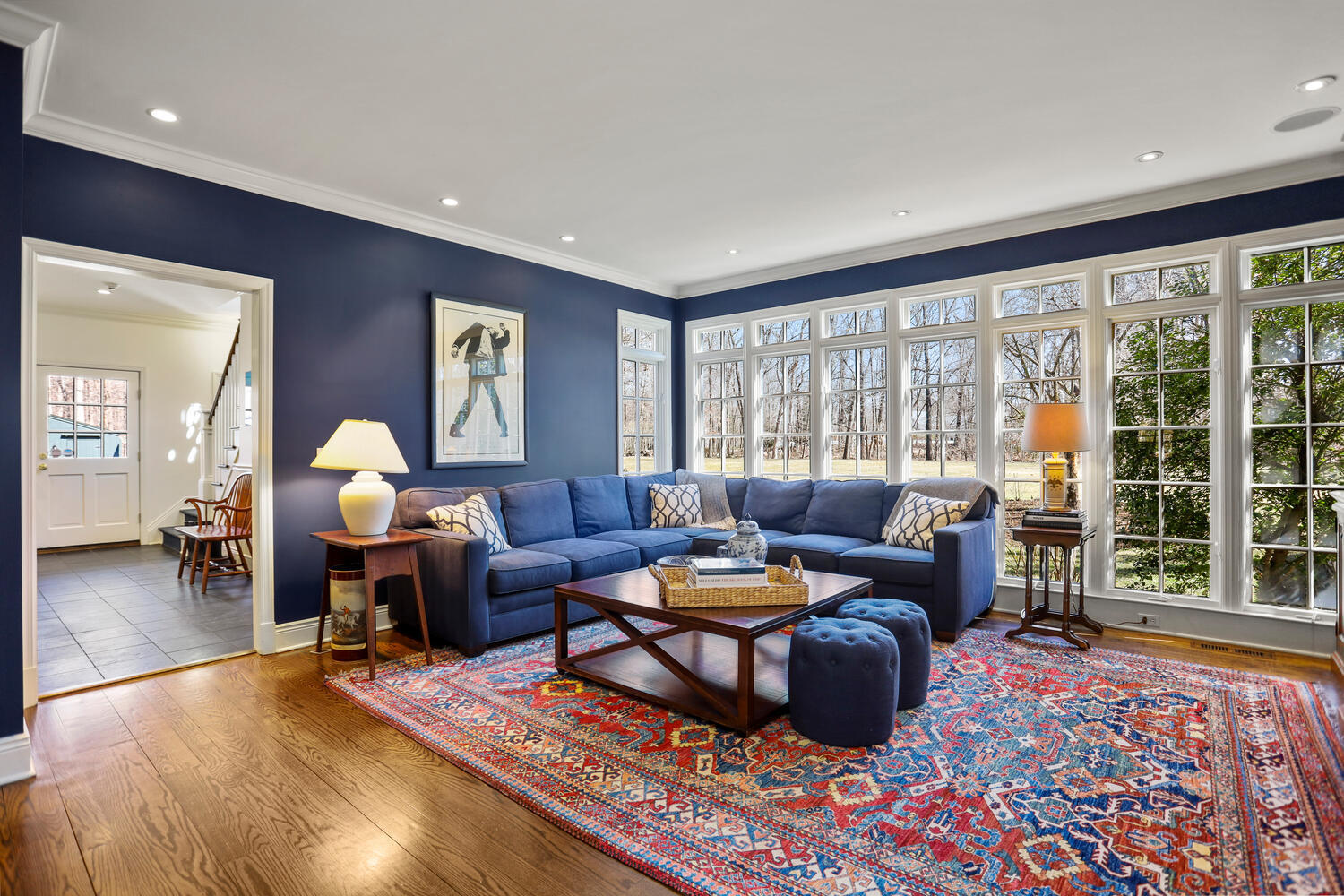 26 Beech Road New Canaan, CT 06840 - Photo 15 of 41 a living room with furniture fireplace and large windows