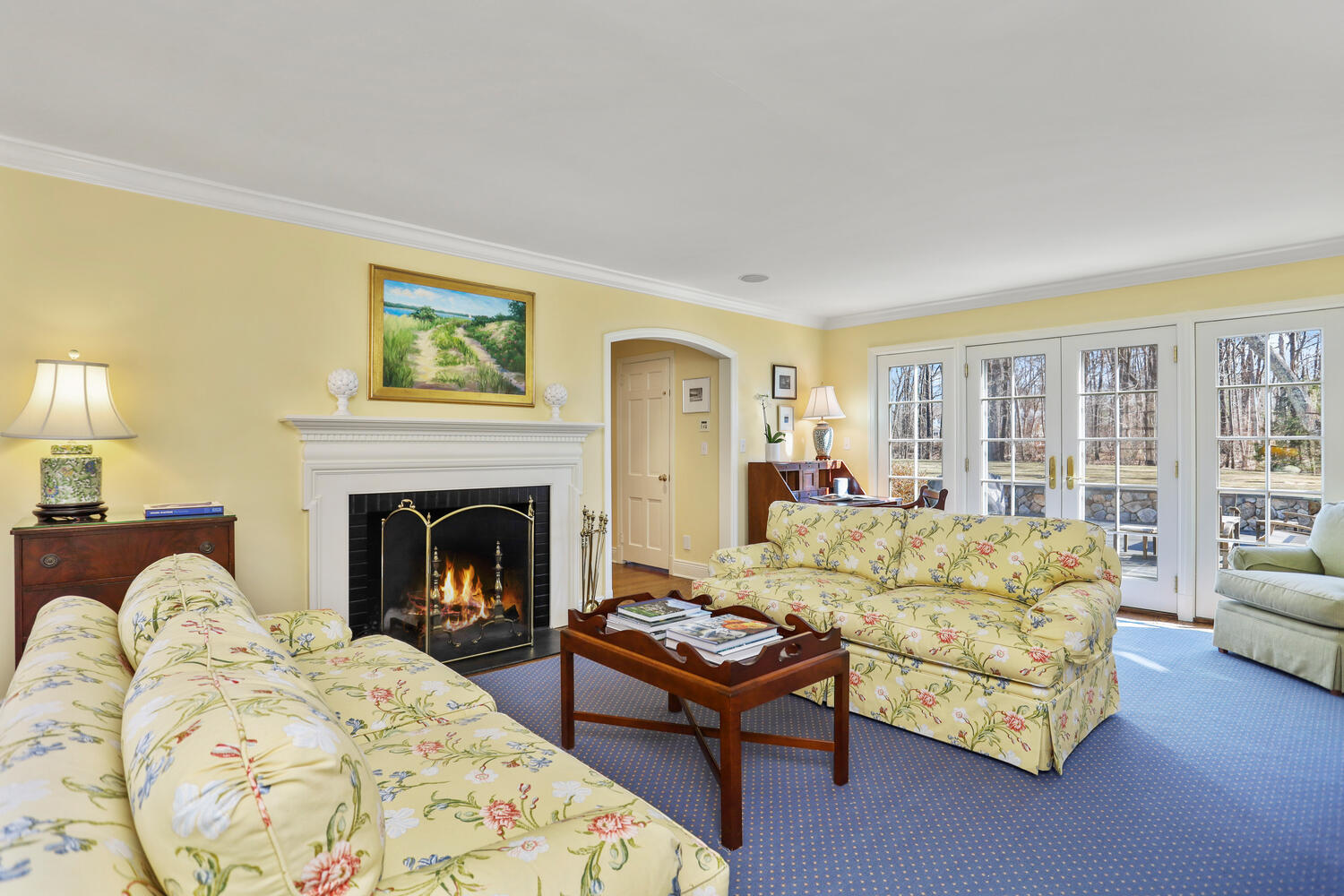26 Beech Road New Canaan, CT 06840 - Photo 18 of 41 a living room with furniture and a fireplace