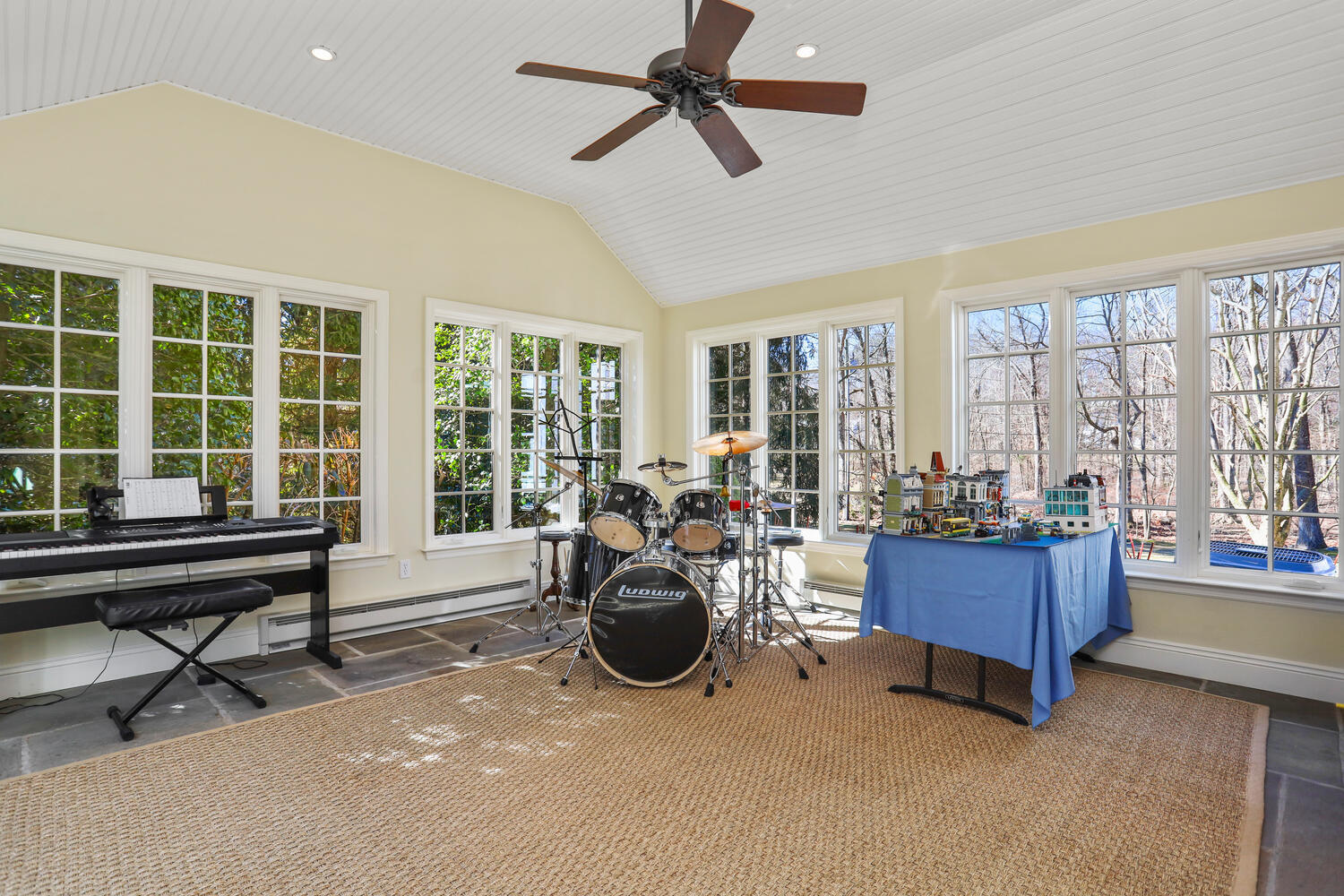 26 Beech Road New Canaan, CT 06840 - Photo 22 of 41 a living room with furniture and a flat screen tv