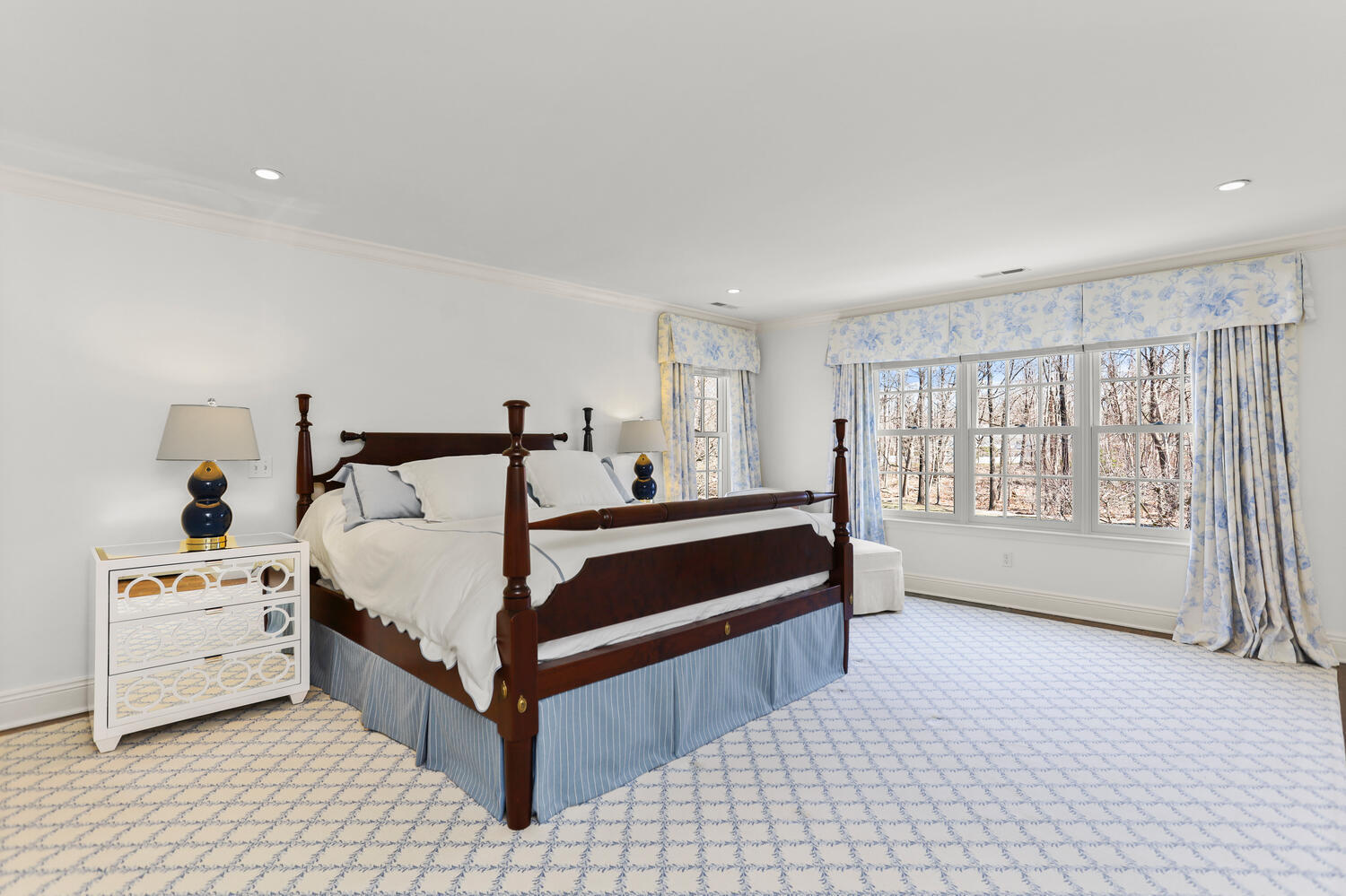 26 Beech Road New Canaan, CT 06840 - Photo 25 of 41 a bedroom with a bed and a large window