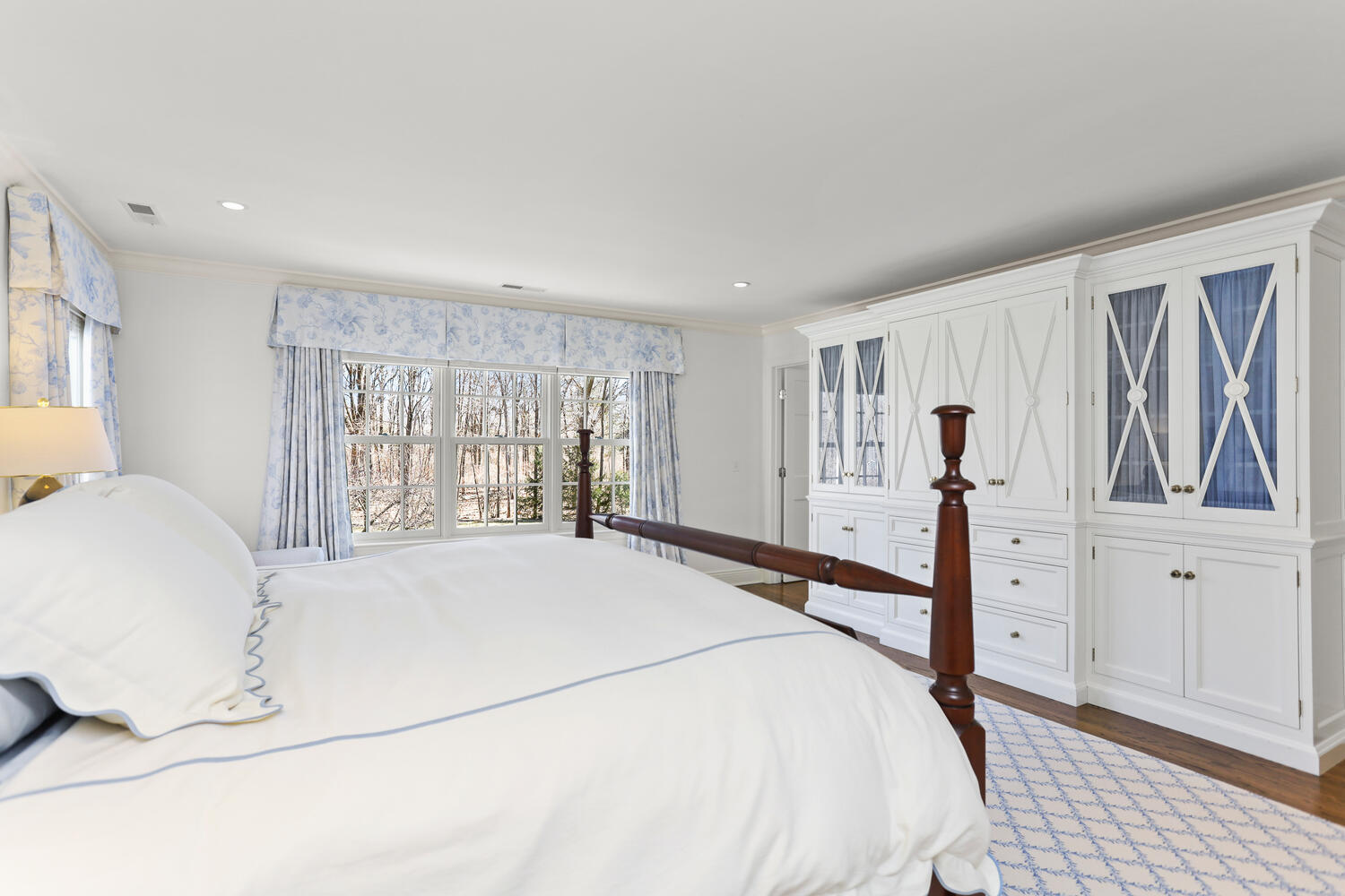 26 Beech Road New Canaan, CT 06840 - Photo 26 of 41 a spacious bedroom with a bed and a window