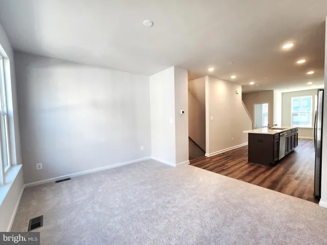 a view of a livingroom with a furniture