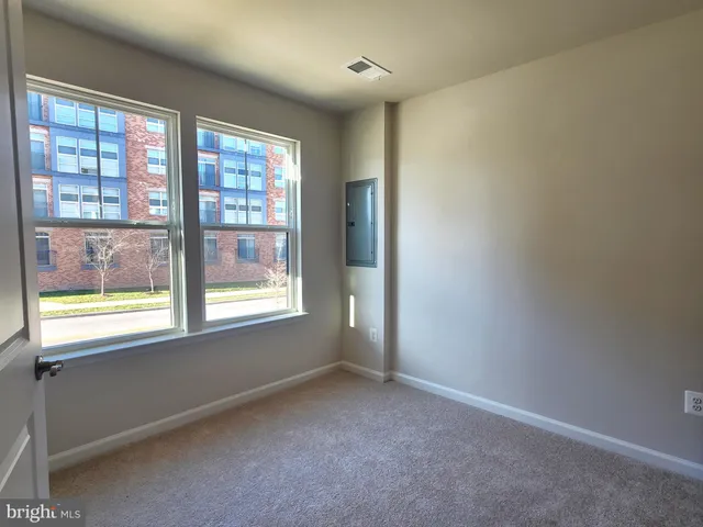 a view of an entryway with livingroom