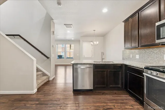 a bathroom with a sink a mirror and a toilet