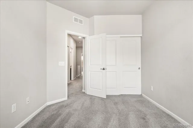 an aerial view of residential house with an outdoor space