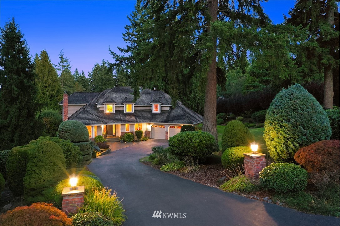 21127 47th Drive Southeast Bothell, WA 98021 - Photo 1 of 38 a view of a house with a yard and garden
